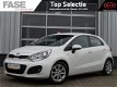 Kia Rio - 1.2 BusinessLine *AIRCO/CRUISECONTROL - 1 - Thumbnail