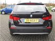 BMW X1 - 2.0 16V SDRIVE NAVI (occasion) ruisecontrol , Clima, PDC, Roofrails, 18 Inch Velgen - 1 - Thumbnail