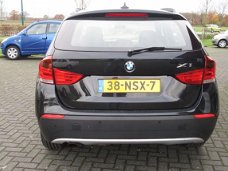 BMW X1 - 2.0 16V SDRIVE NAVI (occasion) ruisecontrol , Clima, PDC, Roofrails, 18 Inch Velgen