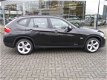 BMW X1 - 2.0 16V SDRIVE NAVI (occasion) ruisecontrol , Clima, PDC, Roofrails, 18 Inch Velgen - 1 - Thumbnail