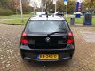 BMW 1-serie - 116i Goed onderhouden/Airco/Elek-ramen/Nap/Apk/AUX/LMV/Mistlampen/CV/CD - 1 - Thumbnail