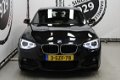 BMW 1-serie - 116i High Executive M PAKKET XENON SPORTLEDER NAVIGATIE STOELVERW M PAKKET - 1 - Thumbnail