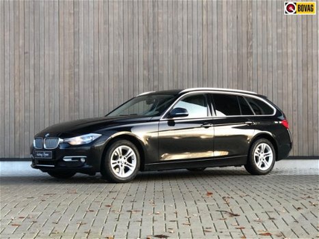 BMW 3-serie Touring - 318d High Executive 2013 Zwart - 1