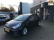 Kia Rio - 1.2 CVVT DynamicLine cruise airco stoelverw pdc bluetooth - 1 - Thumbnail