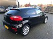 Kia Rio - 1.2 CVVT DynamicLine cruise airco stoelverw pdc bluetooth - 1 - Thumbnail