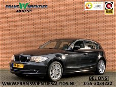 BMW 1-serie - 120i Business Line Sport | Airconditioning | Trekhaak | Cruise control | Parkeersensor