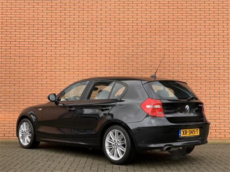 BMW 1-serie - 120i Business Line Sport | Airconditioning | Trekhaak | Cruise control | Parkeersensor - 1