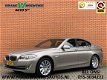 BMW 5-serie - 520i Upgrade Edition | Navigatiesysteem | Parkeersensoren | Cruise control | Leder - 1 - Thumbnail