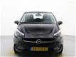 Opel Corsa - 1.4 90pk 5d Favourite | LM Velgen | Navigatie - 1 - Thumbnail