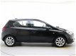 Opel Corsa - 1.4 90pk 5d Favourite | LM Velgen | Navigatie - 1 - Thumbnail