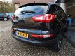 Kia Sportage - 2.0 X-clusive AUTOMAAT - 1 - Thumbnail