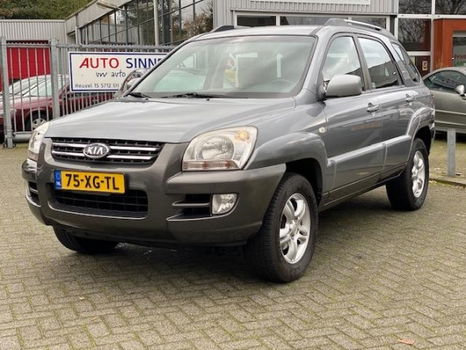 Kia Sportage - 2.0 CVVT X-ecutive 4 seizoenen banden - 1