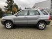 Kia Sportage - 2.0 CVVT X-ecutive 4 seizoenen banden - 1 - Thumbnail