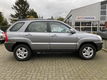 Kia Sportage - 2.0 CVVT X-ecutive 4 seizoenen banden - 1 - Thumbnail