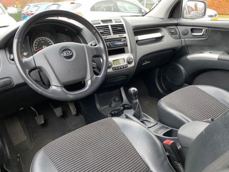 Kia Sportage - 2.0 CVVT X-ecutive 4 seizoenen banden - 1