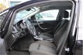 Opel Astra Sports Tourer - 1.4 Turbo Sport Xenon Climate Control Navigatie 3-6-12 M Garantie - 1 - Thumbnail