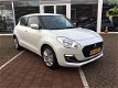 Suzuki Swift - 1.2 Select airco, all season banden, navigatie, achteruitrijcamera 100% dealer onderh - 1 - Thumbnail