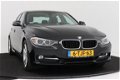 BMW 3-serie - 320d EfficientDynamics Edition Executive | Sportstoelen | LEER | Xenon | Navi - 1 - Thumbnail