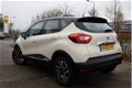 Renault Captur - TCe 90 Dynamique Navi / cruise control / climate control / regen en licht sensor 17 - 1 - Thumbnail