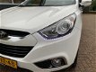 Hyundai ix35 - 1.6i GDI Style , half leer , trekhaak - 1 - Thumbnail