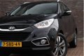 Hyundai ix35 - 2.0i i-Catcher Automaat | Unieke km | Leder | Schuifdak | Navigatie | - 1 - Thumbnail