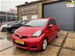 Toyota Aygo - 1.0-12V Aspiration Red Bj.2010 / 5Drs / airco / Lm-velgen - 1 - Thumbnail