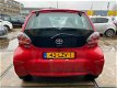 Toyota Aygo - 1.0-12V Aspiration Red Bj.2010 / 5Drs / airco / Lm-velgen - 1 - Thumbnail