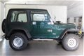 Jeep Wrangler - 4.0 I Hardtop / Youngtimer / Verhoogd - 1 - Thumbnail