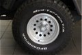 Jeep Wrangler - 4.0 I Hardtop / Youngtimer / Verhoogd - 1 - Thumbnail