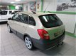 Skoda Fabia Combi - 1.2 TSI Scout Navigatie, Trekhaak - 1 - Thumbnail