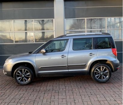 Skoda Yeti - 1.2 TSI Comfort Arctic (105pk) Trekhaak / Cruise Hoge zit Dealer onderhouden - 1