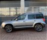 Skoda Yeti - 1.2 TSI Comfort Arctic (105pk) Trekhaak / Cruise Hoge zit Dealer onderhouden - 1 - Thumbnail