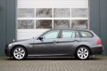 BMW 3-serie Touring - 318d High Executive 122pk Clima/Cruise/Navi/Xenon/PDC/Trekhaak/APK:13-07-2020 - 1 - Thumbnail