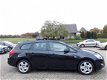 Opel Astra Sports Tourer - 1.4 Turbo Sport - Navi - Deel Leder - Dealer onderhouden - 1 - Thumbnail