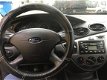 Ford Focus - 1.4-16V Ambiente Blauwmet. 10-2004 Airco 5-deurs - 1 - Thumbnail