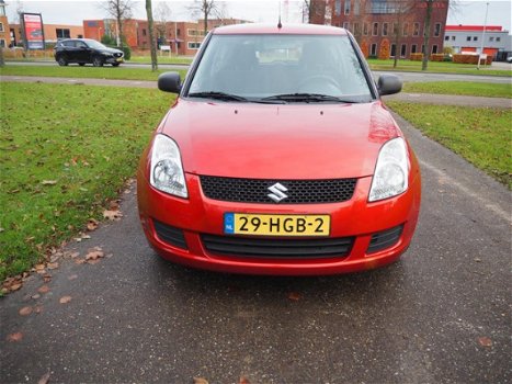 Suzuki Swift - 1.3 Base lm velgen met 4 seizoen banden - 1