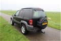 Jeep Cherokee - 2.4I HIGH ROOF VAN GRIJS KENT - 1 - Thumbnail