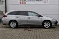 Toyota Auris Touring Sports - 1.8 Hybrid Dynamic Go Navigatie - 1 - Thumbnail