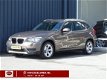 BMW X1 - 2.0i sDrive Automaat Chrome Line | Navi | afn. Trekhaak - 1 - Thumbnail