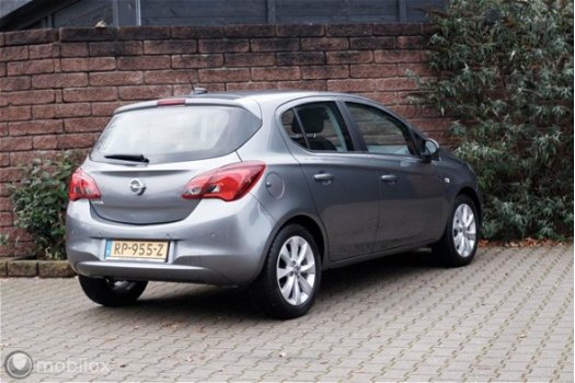 Opel Corsa - 1.4 90PK Favourite nav/tel/pdc/lmv16 - 1