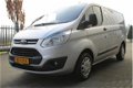 Ford Transit Custom - 270 2.2 TDCI L1H1 Trend / Navigatie / Trekhaak / dealer onderhouden / 1e eigen - 1 - Thumbnail