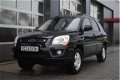 Kia Sportage - 2.0 CVVT X-tra Airco/Cruise/PDC/APK 01-2021 - 1 - Thumbnail