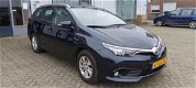 Toyota Auris Touring Sports - 1.8 Hybrid Now Go - 1 - Thumbnail