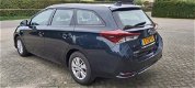 Toyota Auris Touring Sports - 1.8 Hybrid Now Go - 1 - Thumbnail