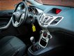 Ford Fiesta - 1.25 Titanium + Airco / Clima / Cruise control - 1 - Thumbnail