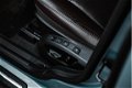 Volvo V50 - 2.0i 145PK Summum Leer/ Trekhaak/ Stoelverwarming/ Cruise Control - 1 - Thumbnail
