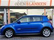 Suzuki Swift - 1.3 4Grip Exclusive BJ.06 / Sport Pakket / 4X4 / Keyless / Airco / Lmv / 5 drs - 1 - Thumbnail