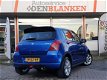 Suzuki Swift - 1.3 4Grip Exclusive BJ.06 / Sport Pakket / 4X4 / Keyless / Airco / Lmv / 5 drs - 1 - Thumbnail