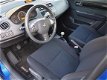 Suzuki Swift - 1.3 4Grip Exclusive BJ.06 / Sport Pakket / 4X4 / Keyless / Airco / Lmv / 5 drs - 1 - Thumbnail