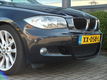 BMW 1-serie - 118i High Executive*M-sportpakket*Kantelschuifdak*Halfleder sport interieur*103.500 KM - 1 - Thumbnail